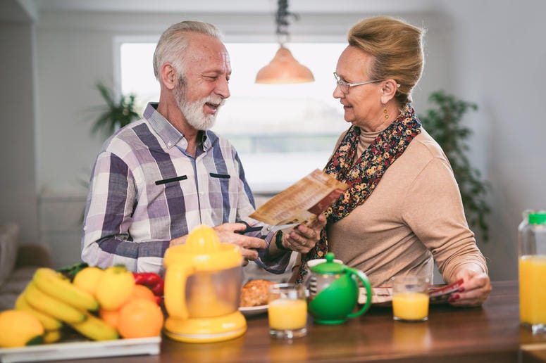 Here's a pic of your parents giving love coupons. Ew. You're welcome.